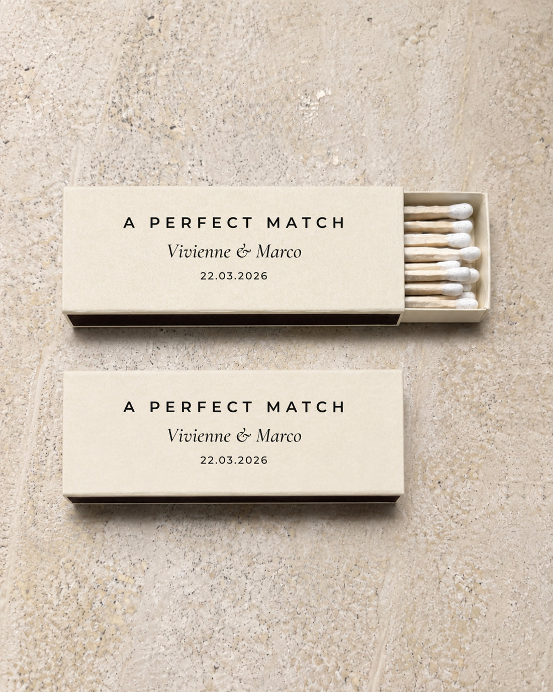 Ember slim matchbox in ivory, open and closed pair on stone