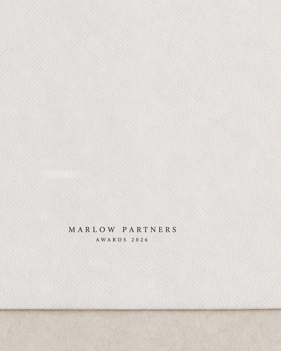 Close view of the black ink mark on a branded cocktail napkin