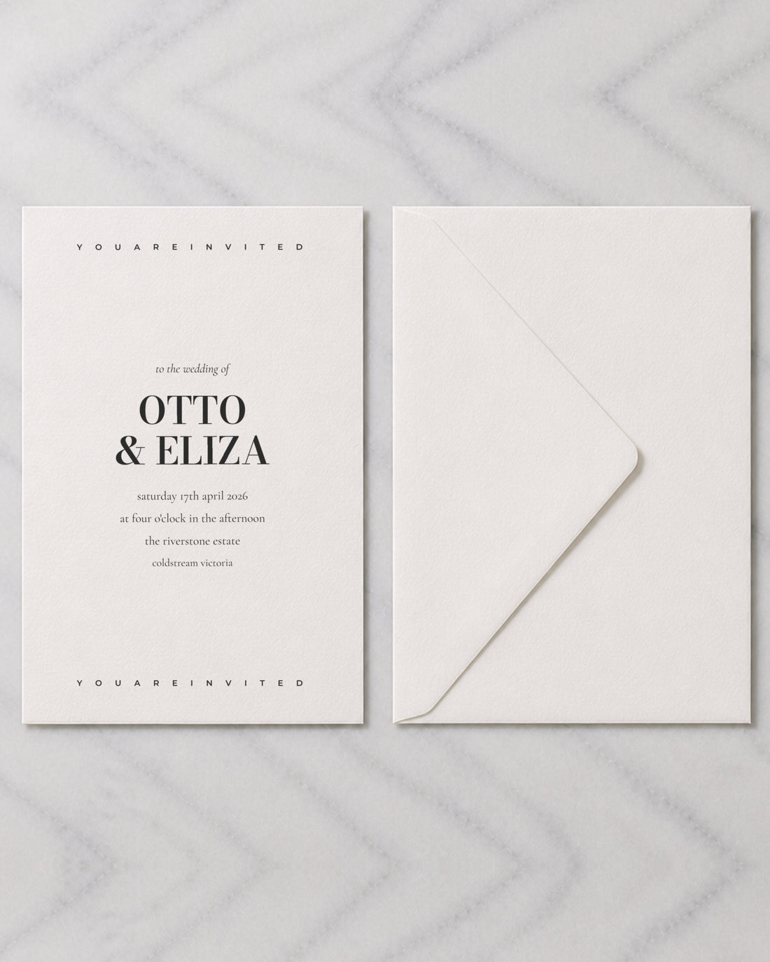 The Strand wedding invitation, shown with its envelope
