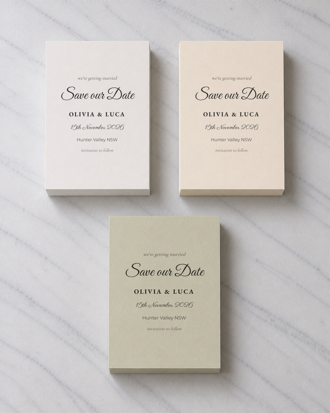 The Nell save the date, shown in three colourways