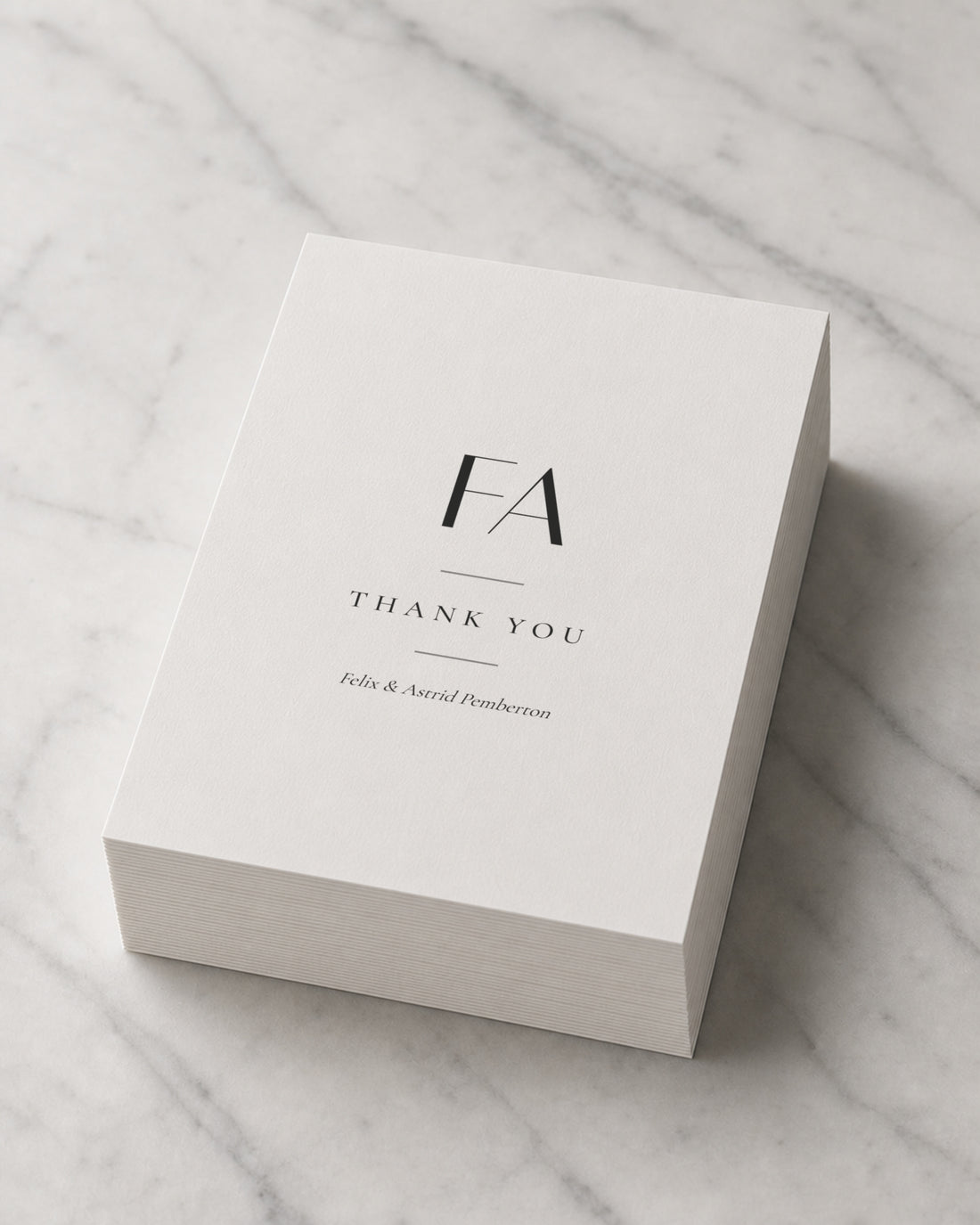 A thick stack of Marchmont thank you cards on marble
