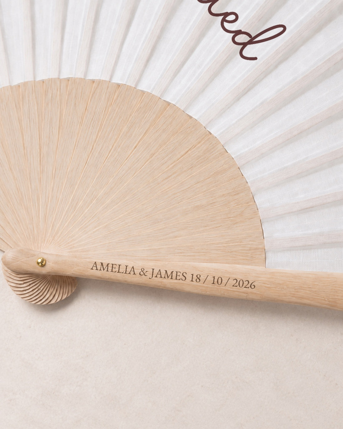 Just Married, engraving detail, solid bamboo fan on light marble