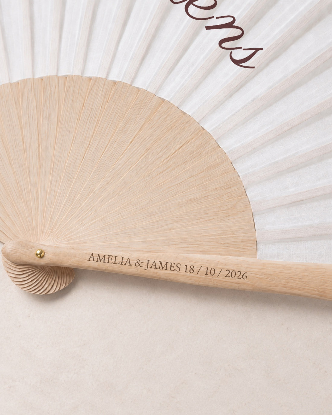 The Hen, engraving detail, solid bamboo fan on light marble