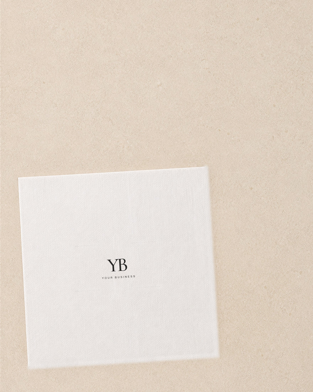 A cocktail napkin printed with a placeholder business monogram