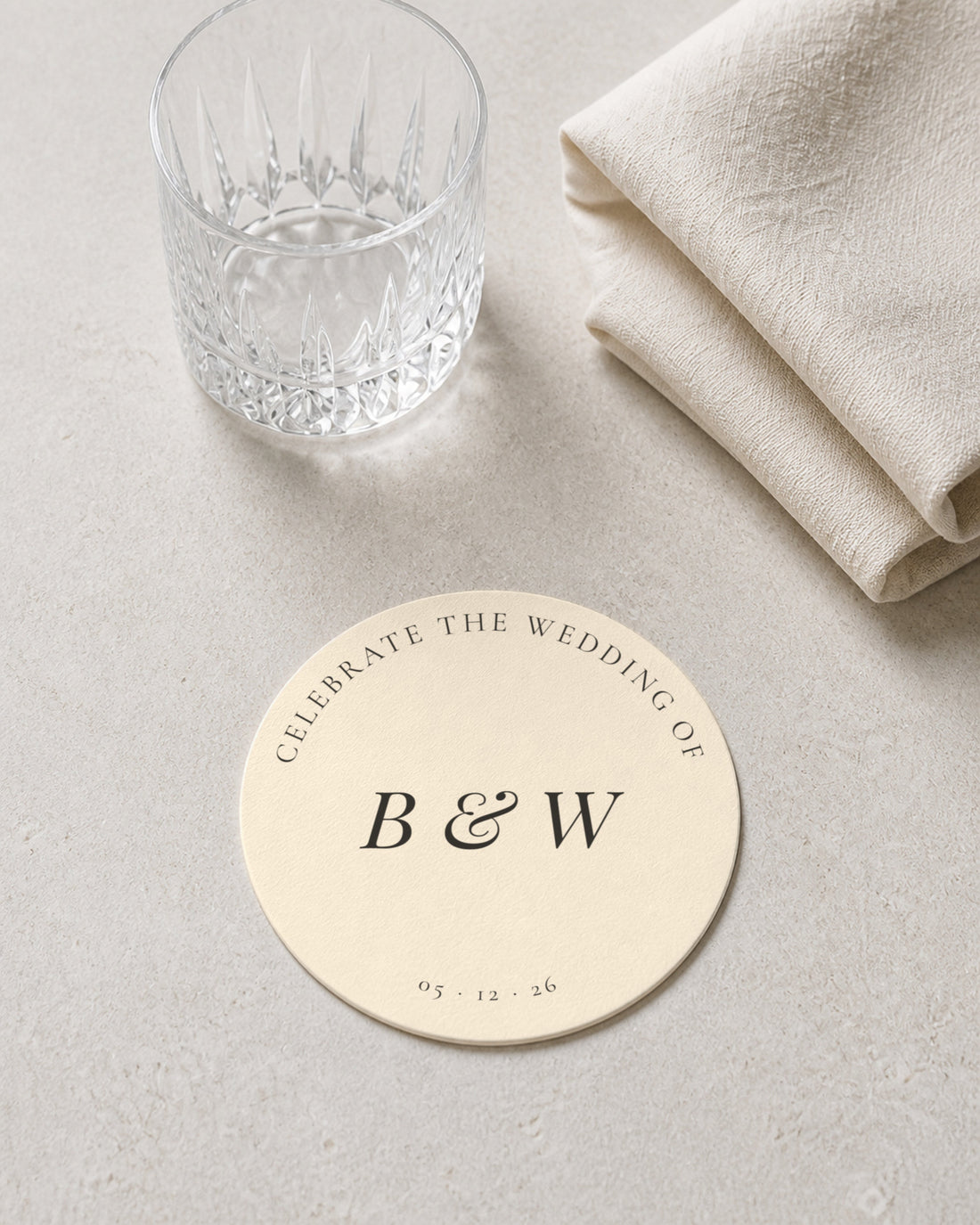 Camellia ivory coaster at a place setting