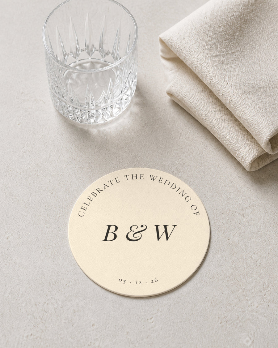 Camellia ivory coaster at a place setting