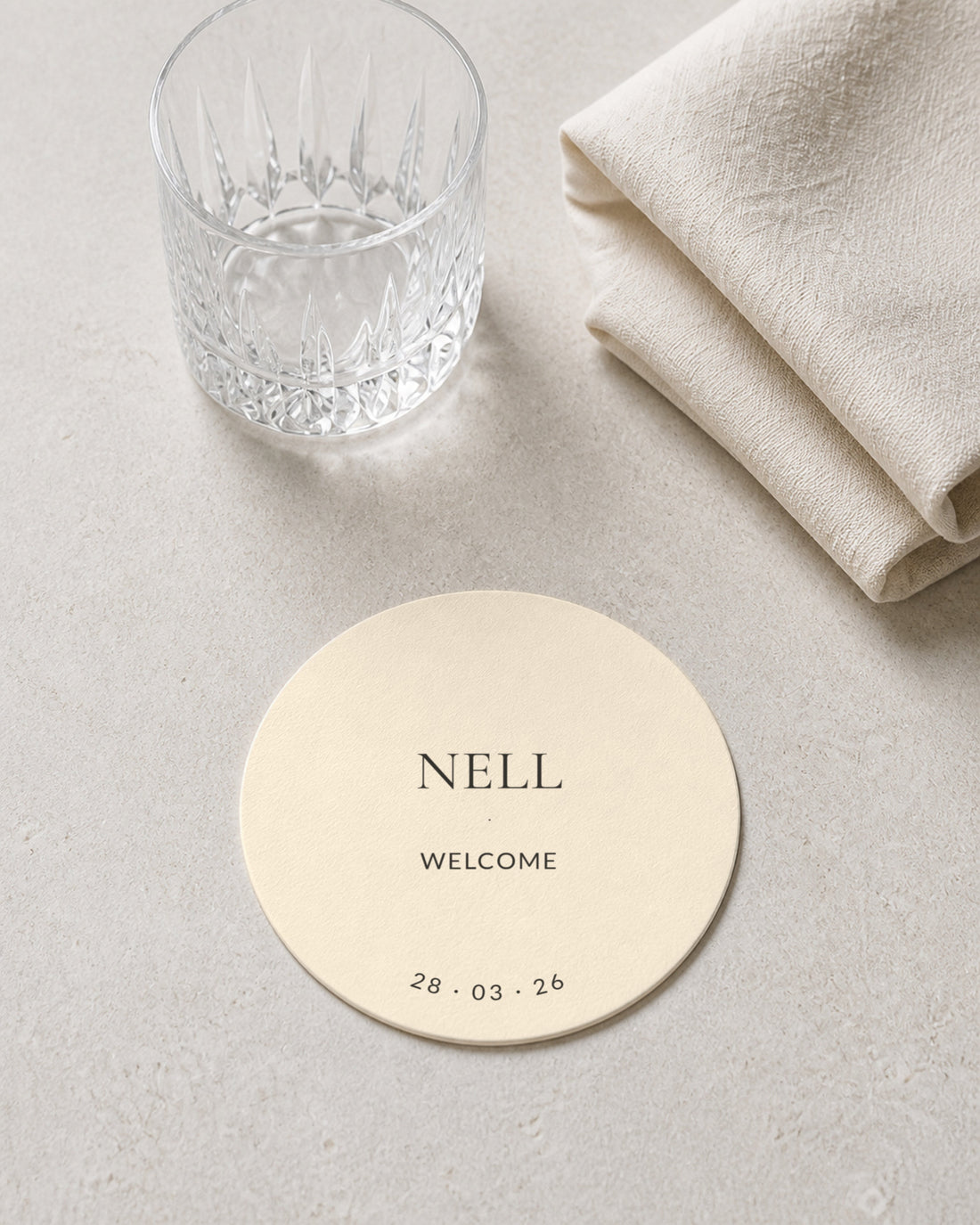 Winifred ivory coaster at a place setting