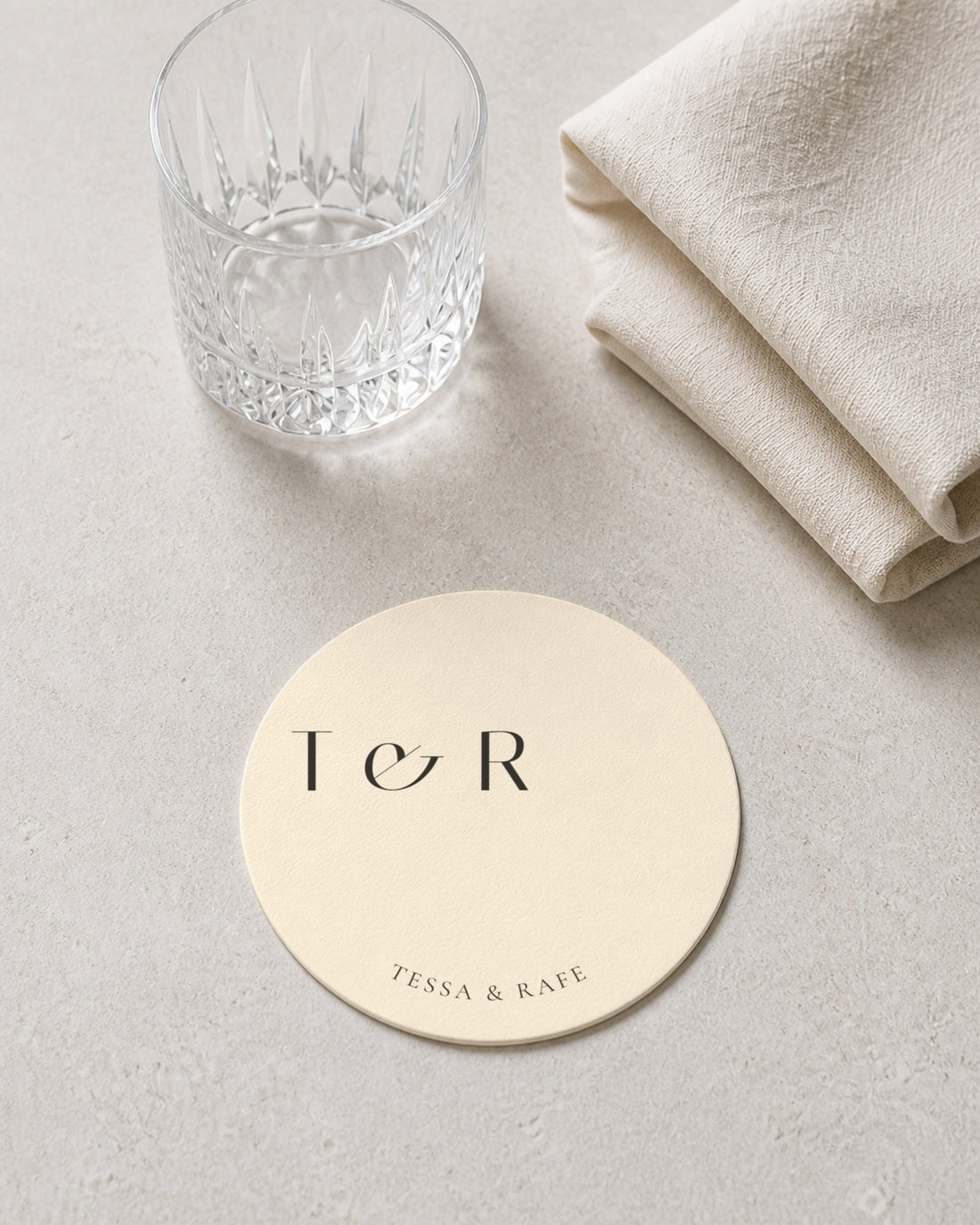 Burgundy ivory coaster at a place setting