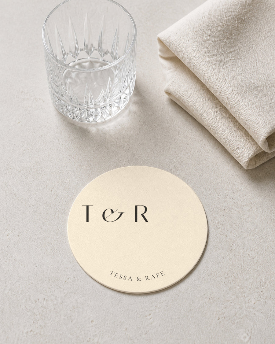 Burgundy ivory coaster at a place setting