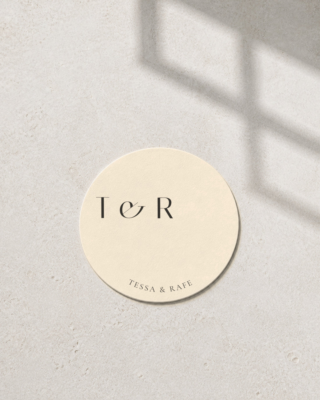 Burgundy ivory coaster in window light