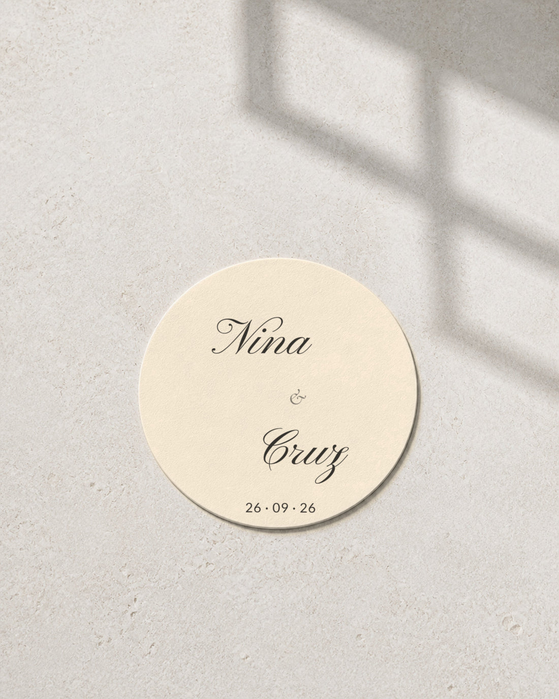 Everly ivory coaster in window light