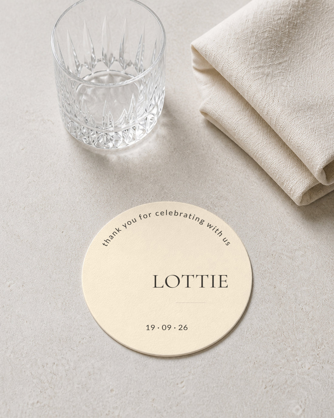 Bronte ivory coaster at a place setting