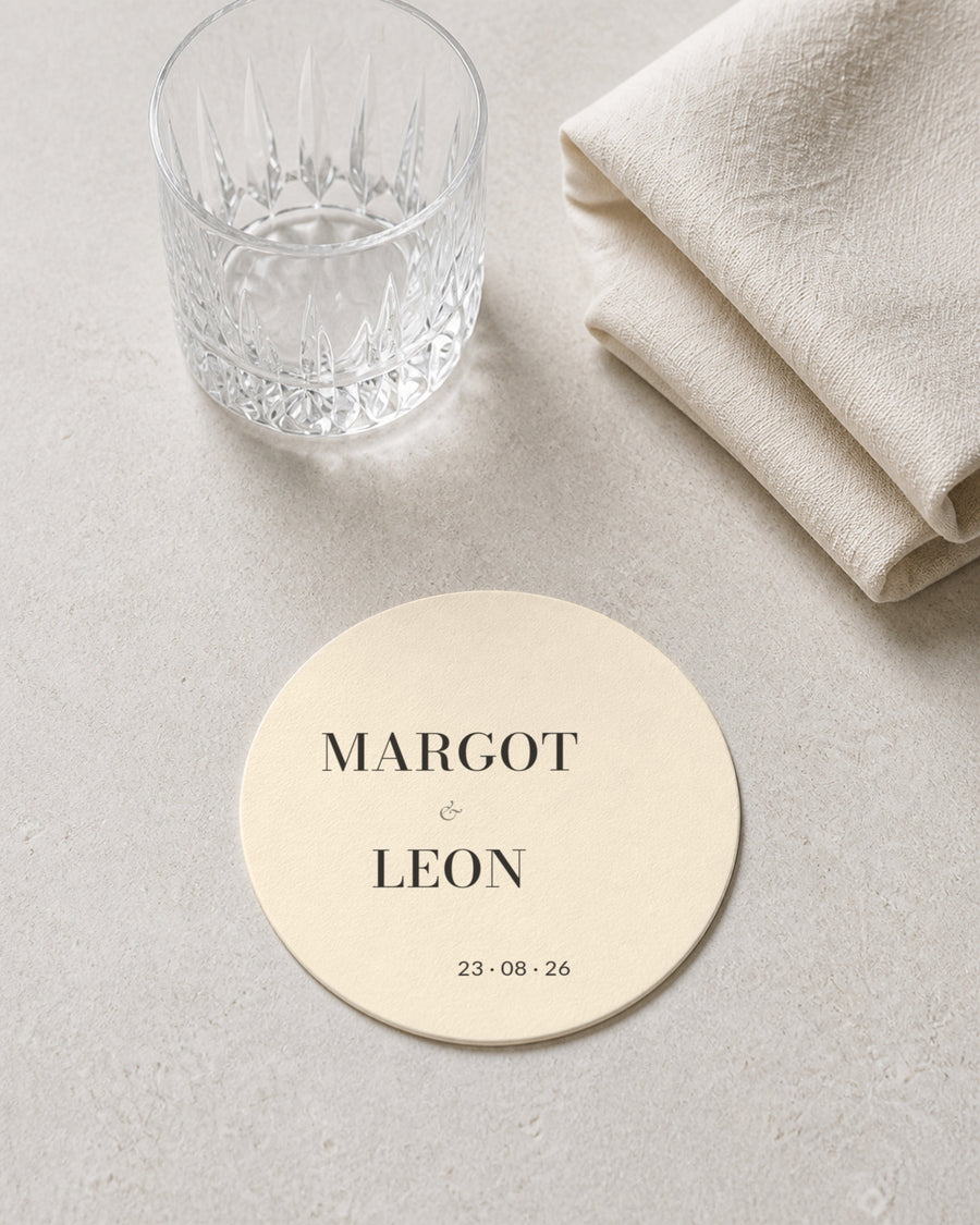 Graphite ivory coaster at a place setting