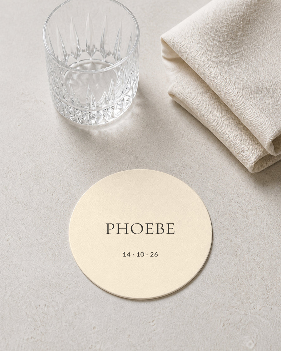 Linen ivory coaster at a place setting