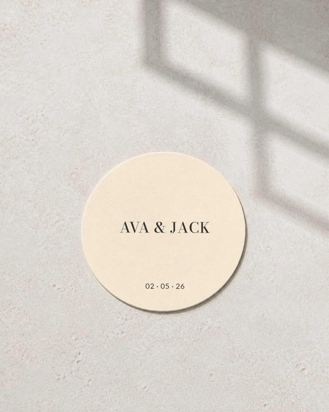 Marble ivory coaster in window light