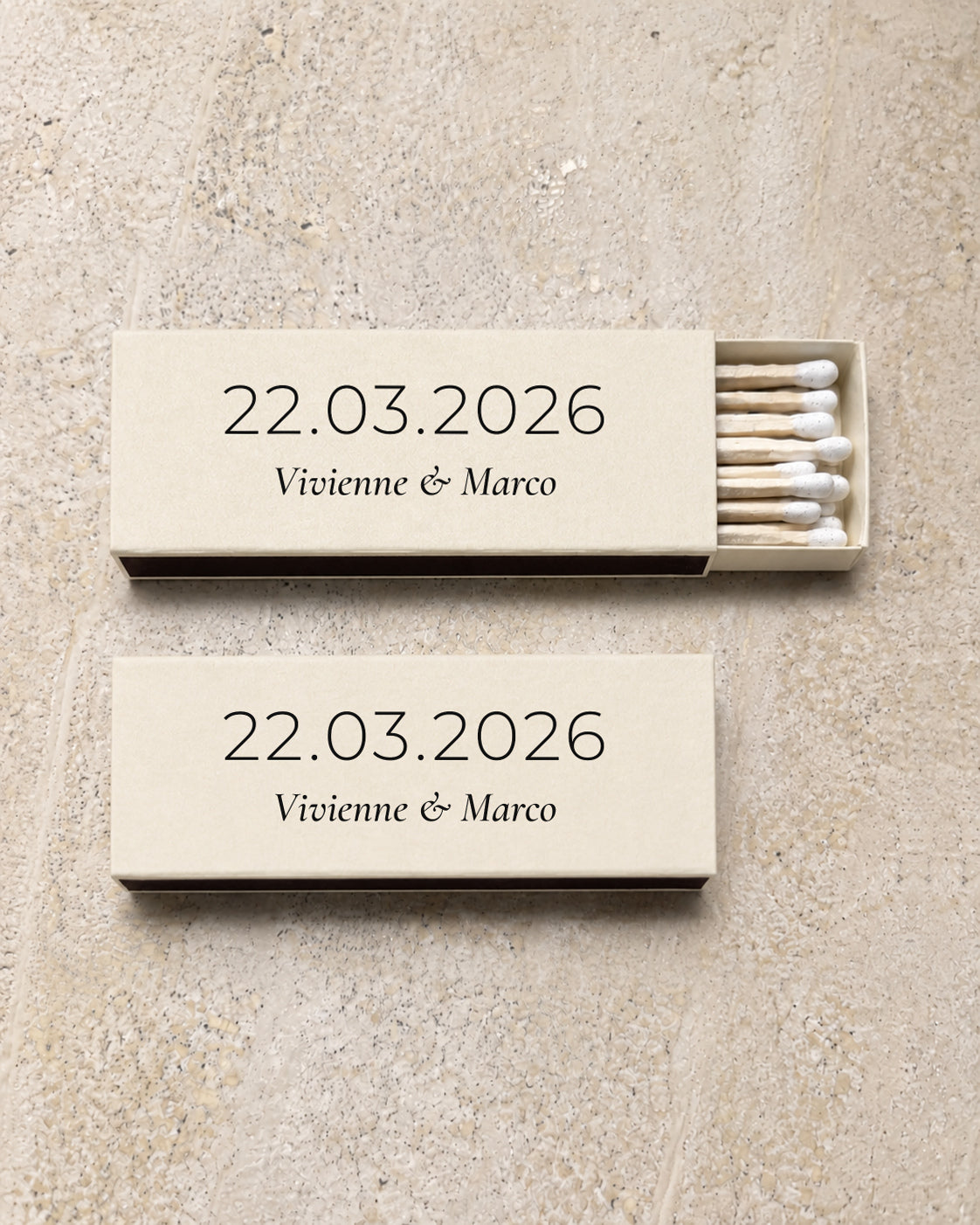 Beacon slim matchbox in ivory, open and closed pair on stone