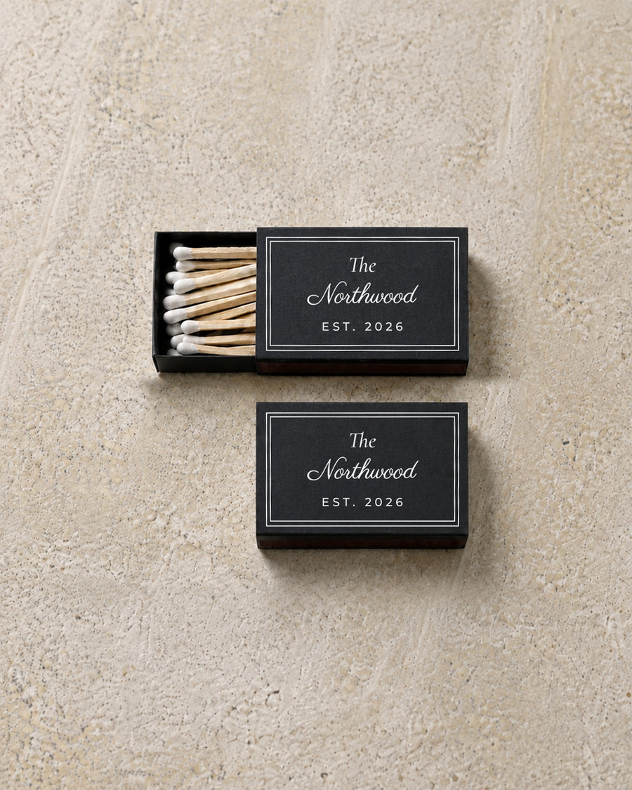 Northwood classic matchbox in black, open and closed pair on stone