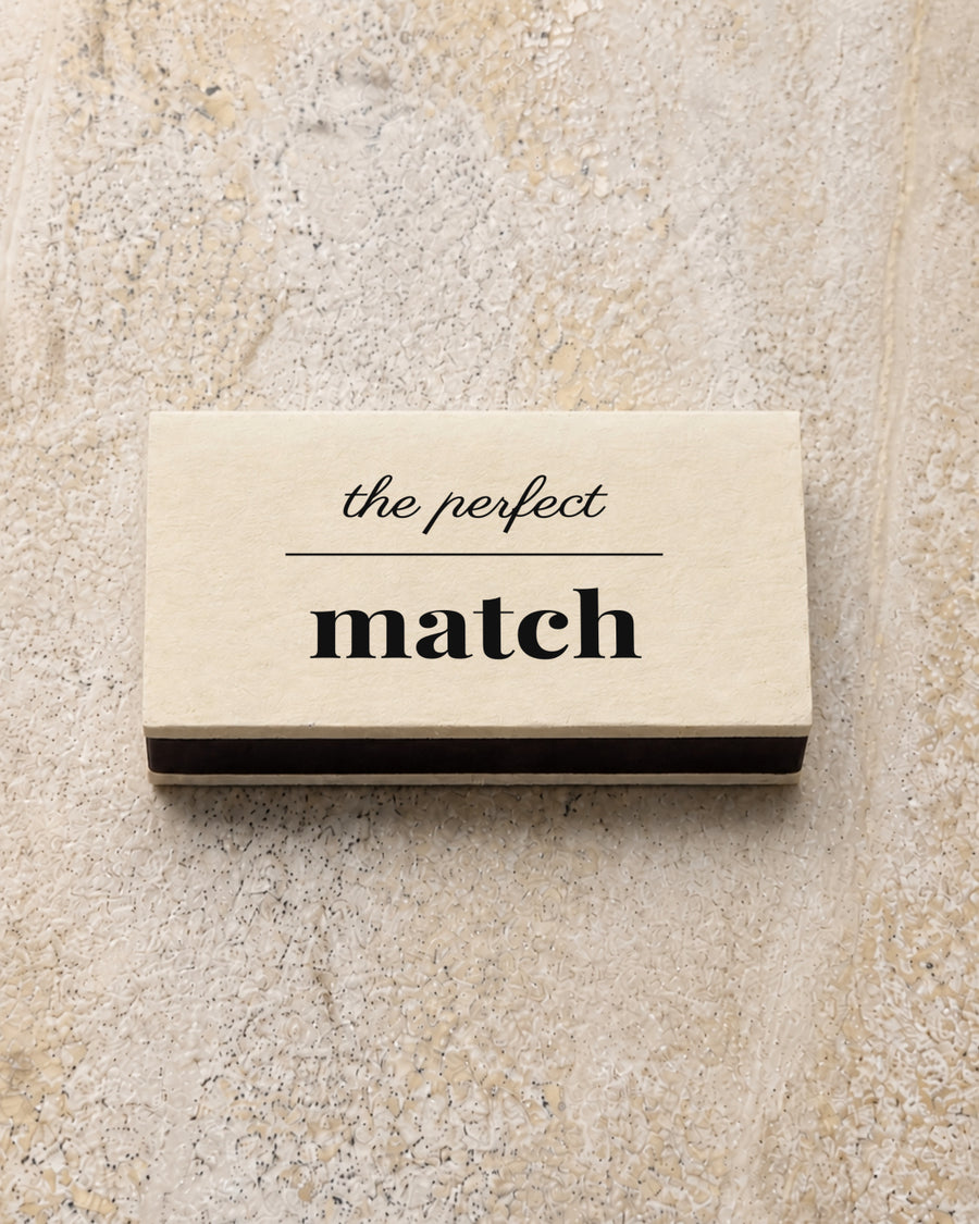 Marlowe classic matchbox in ivory, closed on stone