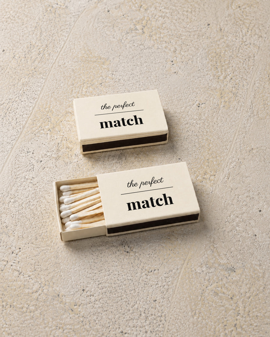 Marlowe classic matchbox in ivory, angled open and closed pair on stone