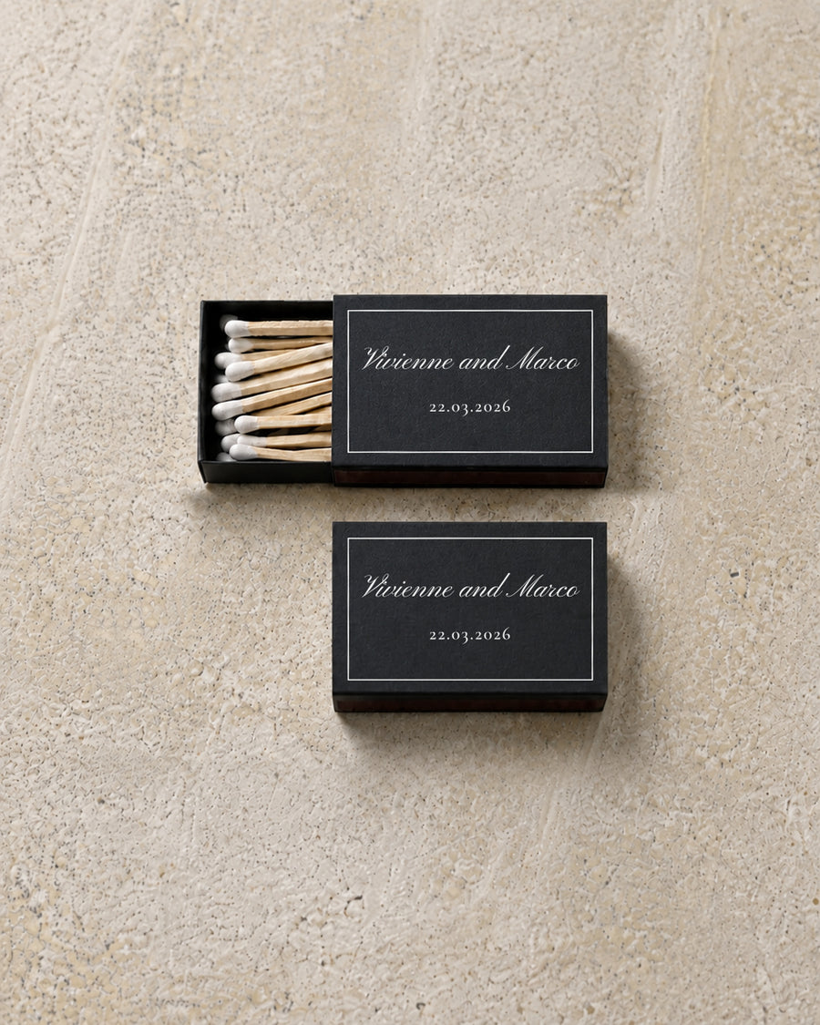 Vivienne classic matchbox in black, open and closed pair on stone