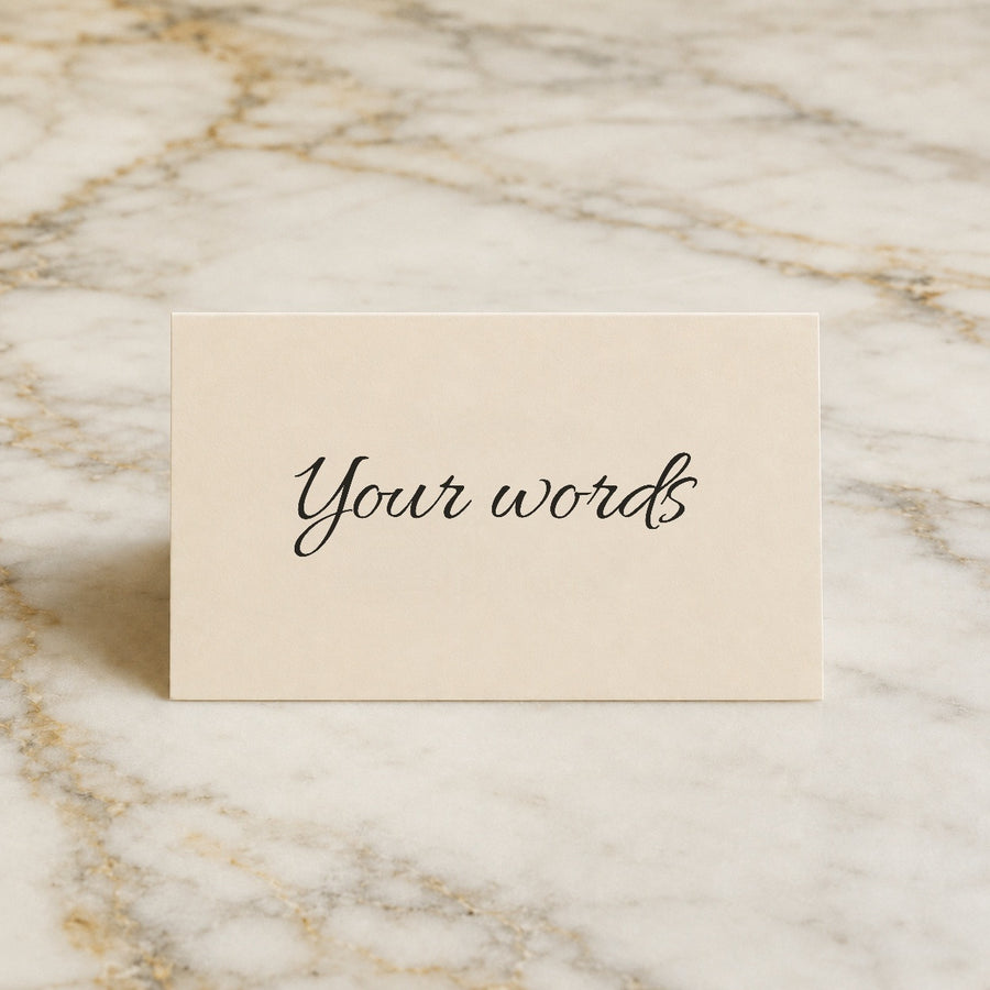 A blank wedding place card printed with the words Your words, ready for your own wording