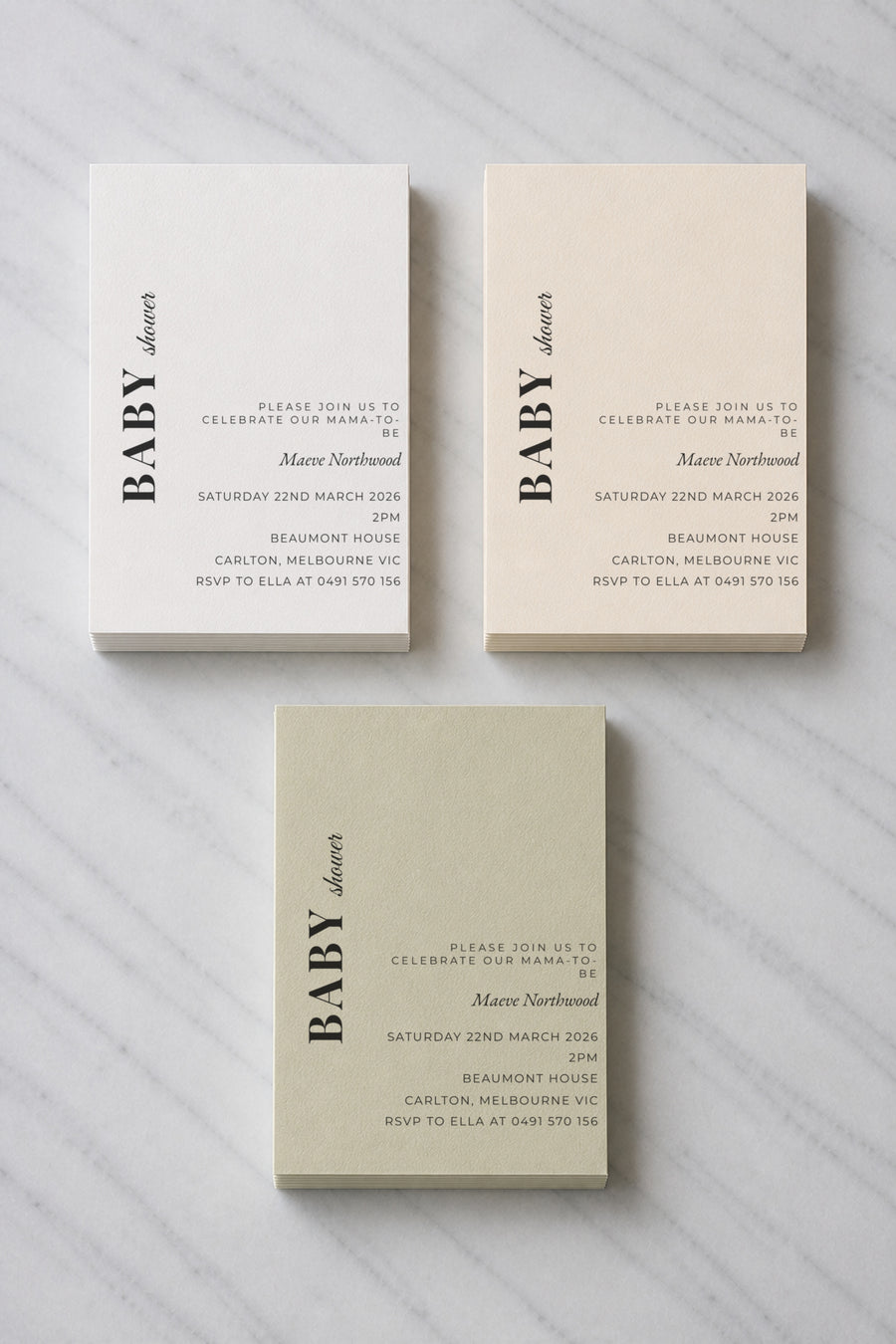 The Basalt baby shower invitation, shown in three colourways