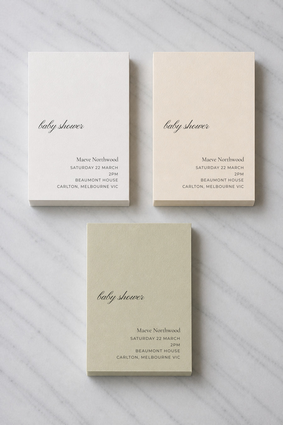 The Sorrel baby shower invitation, shown in three colourways