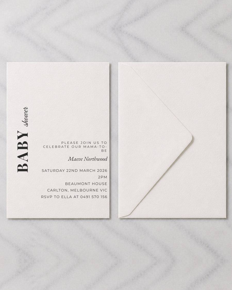 The Basalt baby shower invitation, shown with its envelope