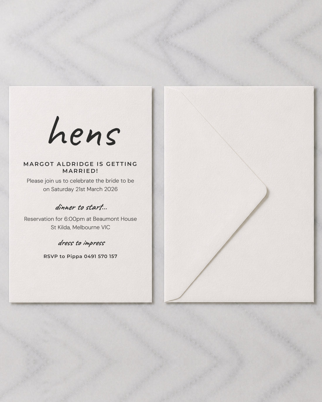 The Cassia hens invitation, shown with its envelope