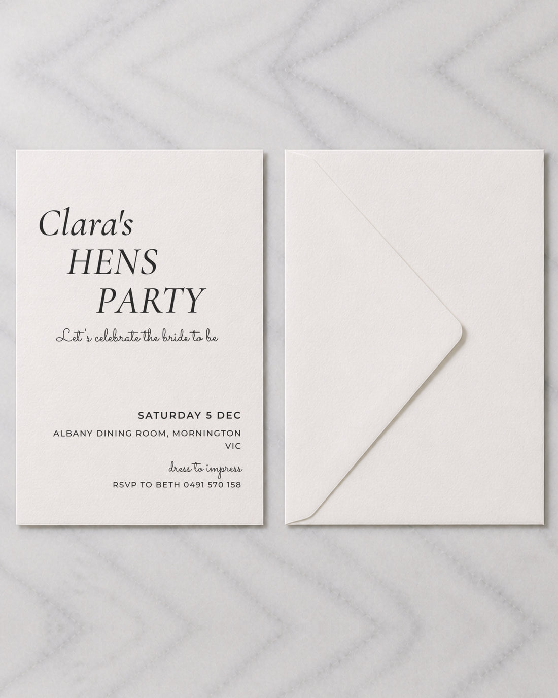 The Merlot hens invitation, shown with its envelope