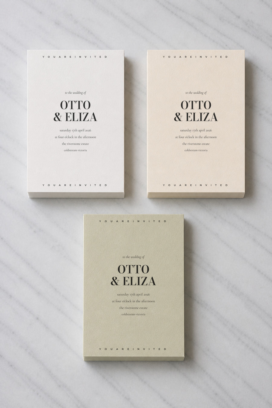 The Strand wedding invitation, shown in three colourways