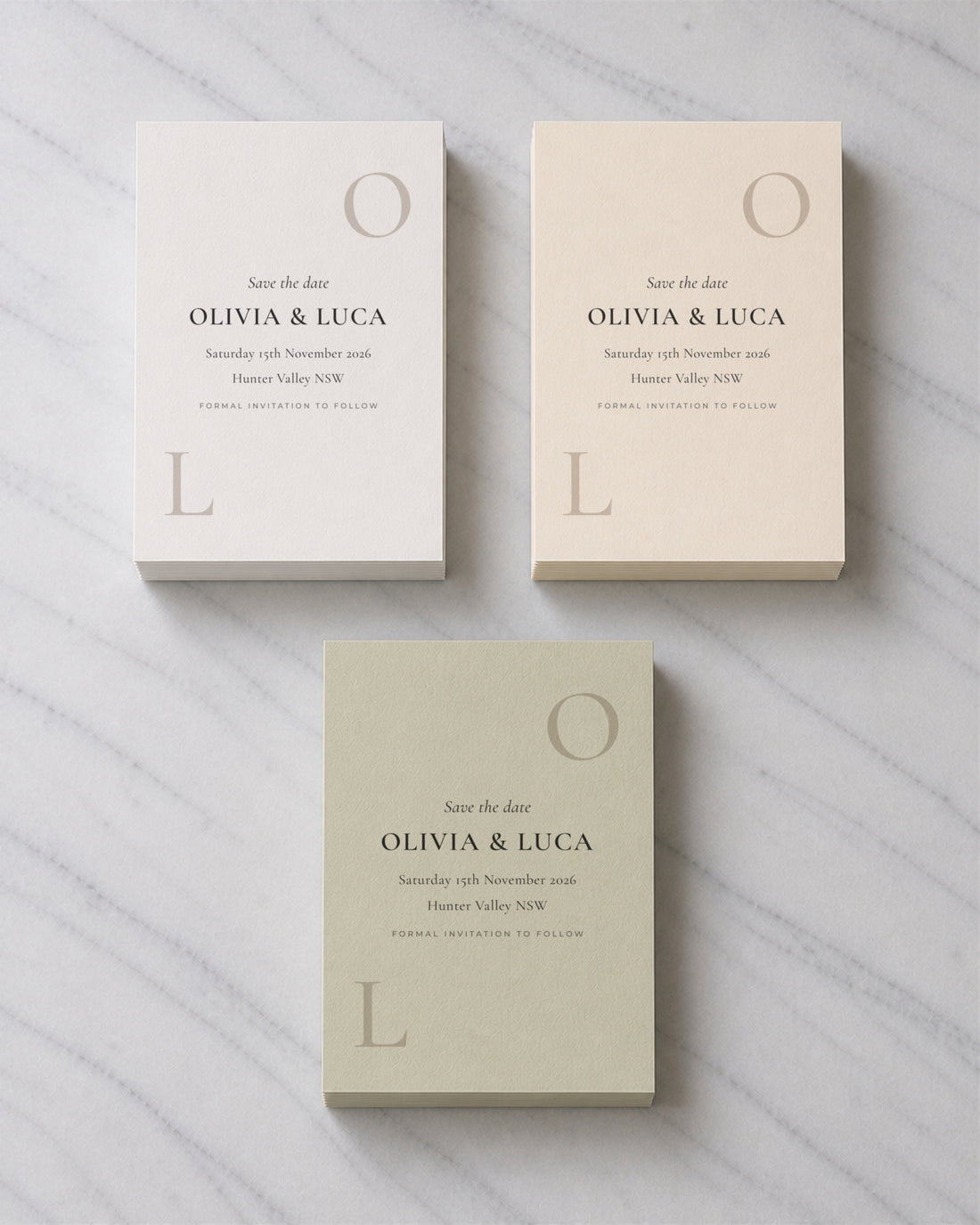 The Emblem save the date, shown in three colourways