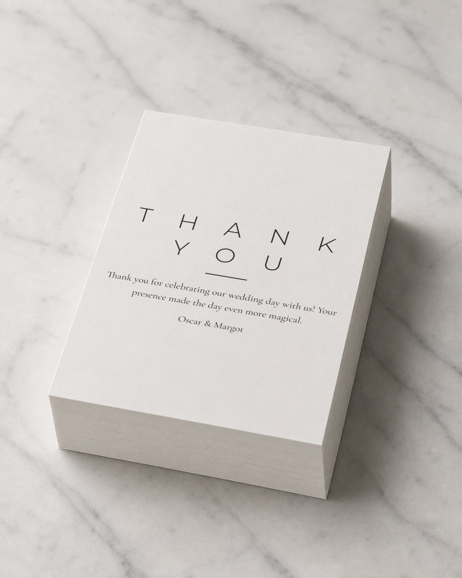 A thick stack of Stacked thank you cards on marble