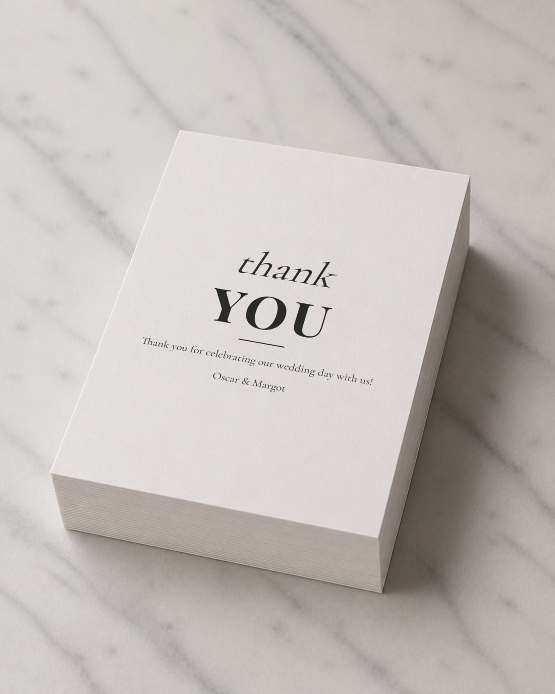 A thick stack of Mixed thank you cards on marble