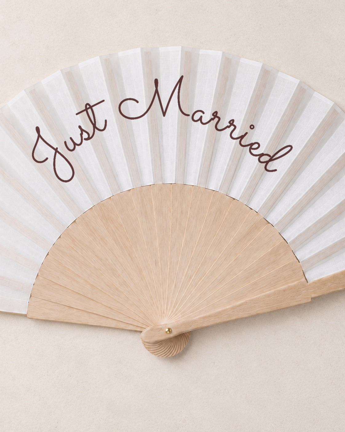 Just Married, close open fan, solid bamboo fan on light marble