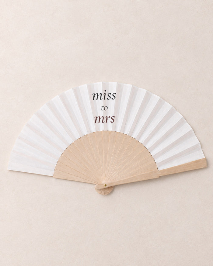 Miss to Mrs, hero, solid bamboo fan on light marble