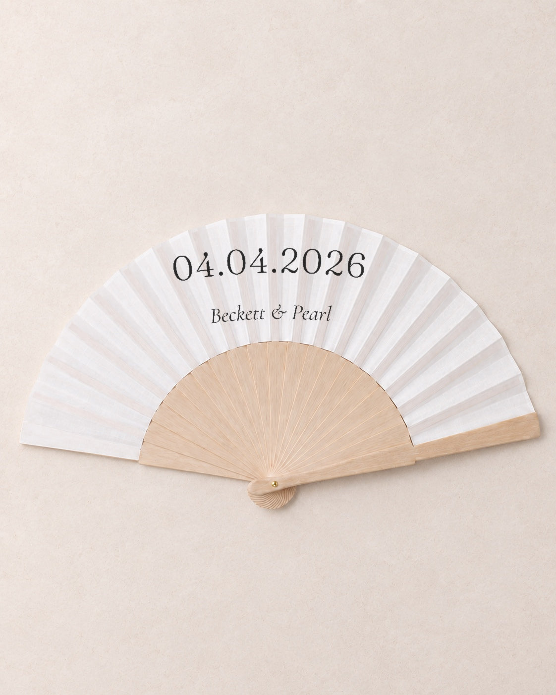 The Date, hero, solid bamboo fan on light marble