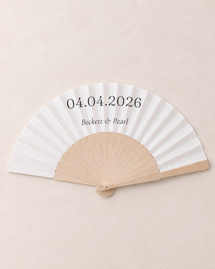 The Date, hero, solid bamboo fan on light marble