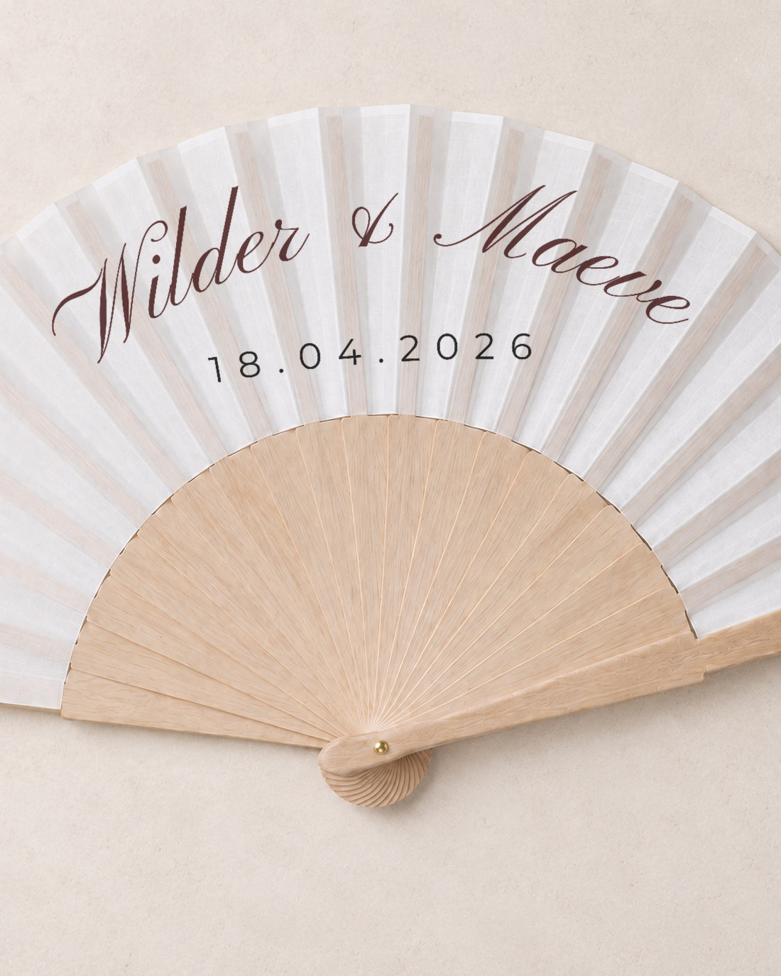 Wilder, close open fan, solid bamboo fan on light marble