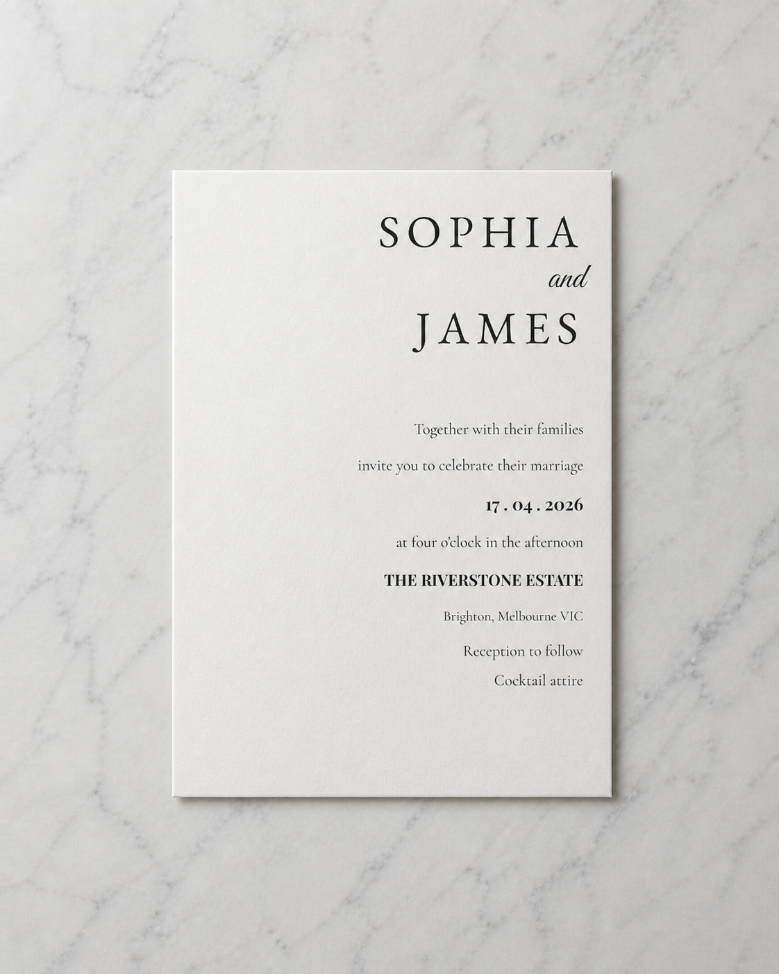 Wedding invitation on pale marble